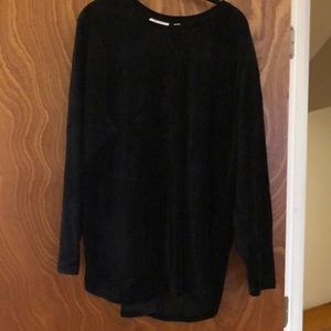 Black suede like tunic with pockets.